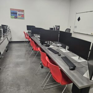 red chairs and folding desks